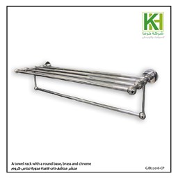 Show details for A towel rack with a round base, brass and chrome Picture of A towel rack with a round base, brass and chrome